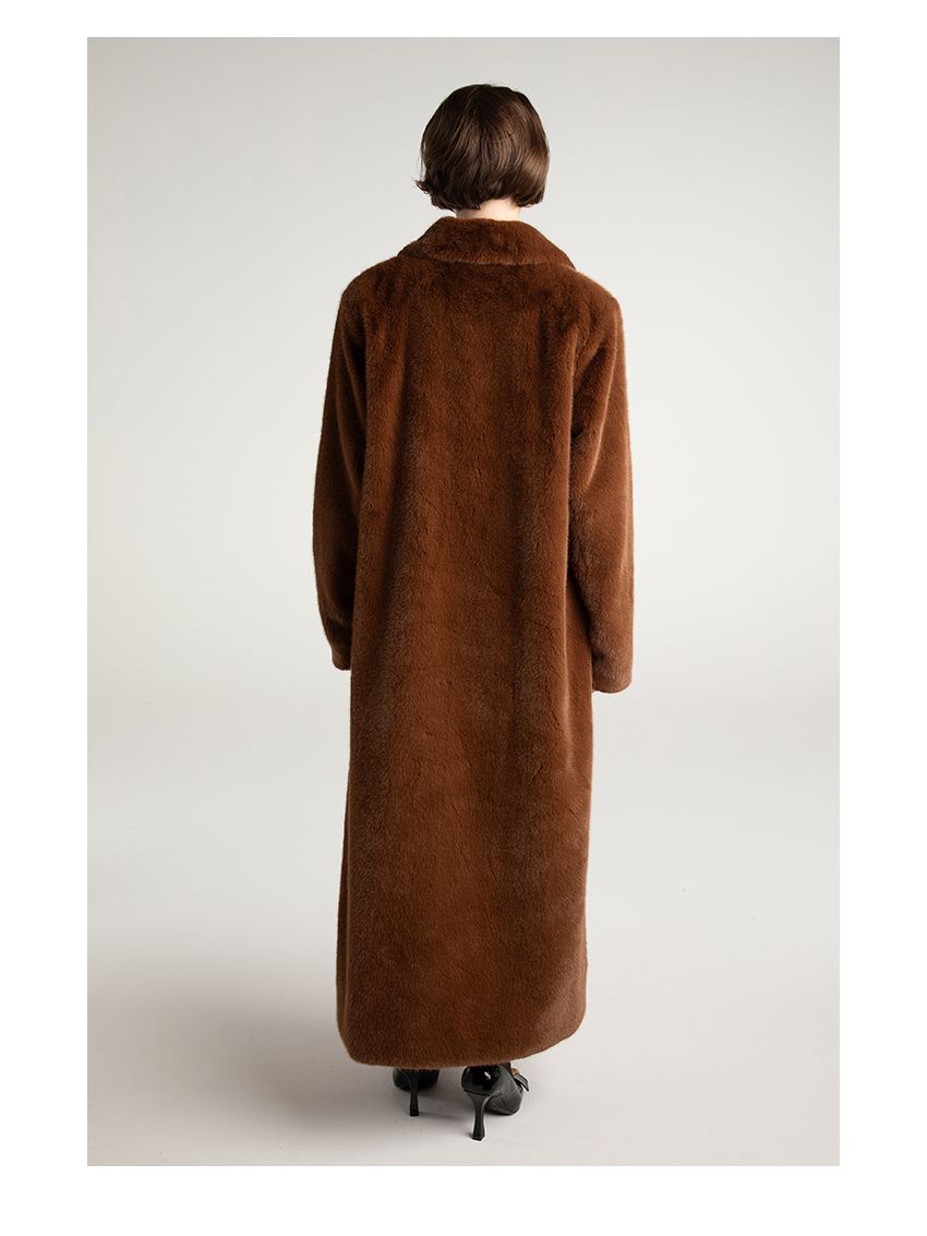 Vintage atmosphere teddy bear and fur long coat